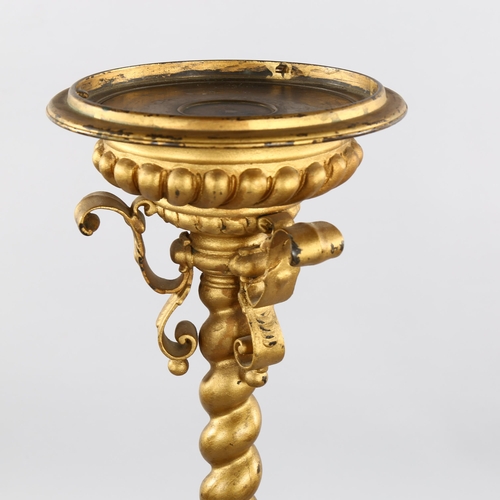 1268 - A 19th century cast bronze torcher stand, with spiral twist centre column and tripod base, height 12... 