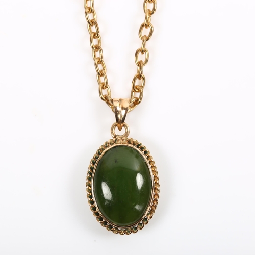 202 - A 14ct gold nephrite pendant necklace, on gilt-metal cable link chain, pendant height 23.7mm, chain ... 