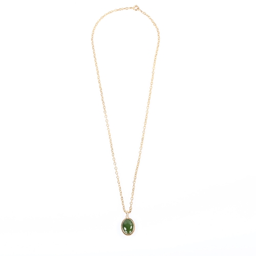 202 - A 14ct gold nephrite pendant necklace, on gilt-metal cable link chain, pendant height 23.7mm, chain ... 