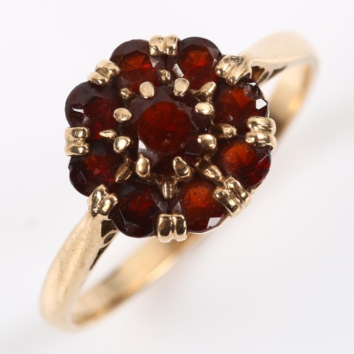 206 - A 9ct rose gold garnet cluster ring, setting height 10.8mm, size R, 2.7g