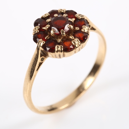 206 - A 9ct rose gold garnet cluster ring, setting height 10.8mm, size R, 2.7g