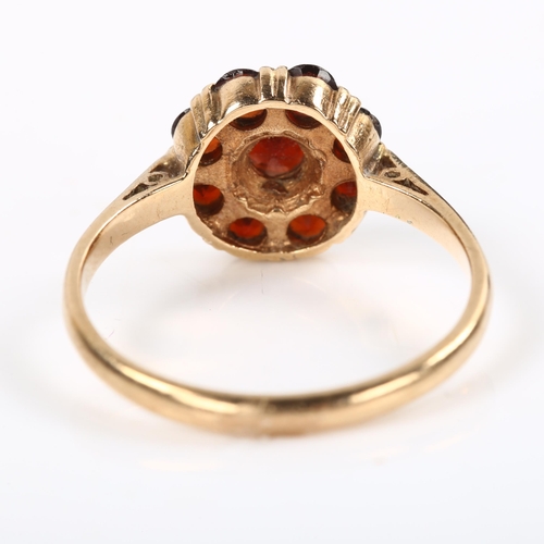 206 - A 9ct rose gold garnet cluster ring, setting height 10.8mm, size R, 2.7g