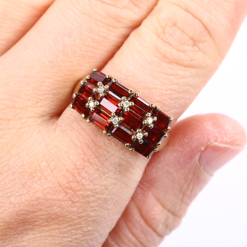 215 - A 9ct gold garnet and diamond dress ring, setting height 10.5mm, size R, 3.8g