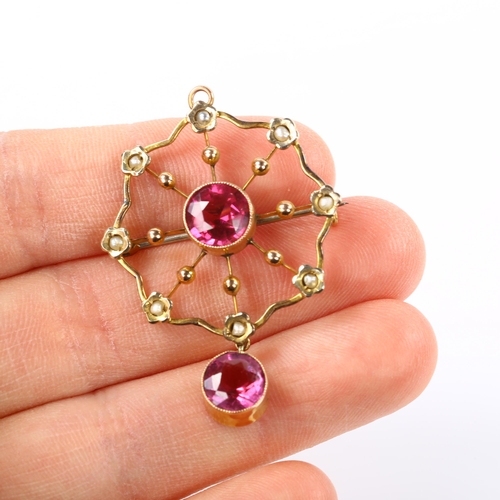 216 - An Art Nouveau 9ct rose gold pink stone and split pearl spiderweb pendant/brooch, pendant height 41.... 