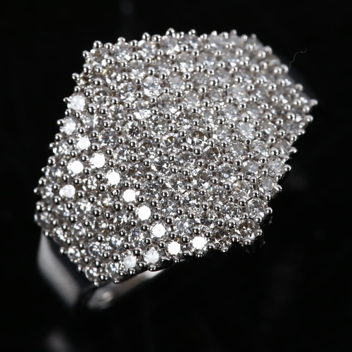 222 - An 18ct white gold diamond cluster dress ring, pave set with modern round brilliant-cut diamonds, to... 