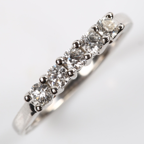 226 - An 18ct white gold five stone diamond ring, set with modern round brilliant-cut diamonds, total diam... 