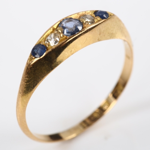 227 - An early 20th century 18ct gold graduated five stone sapphire and diamond half hoop ring, maker's ma... 