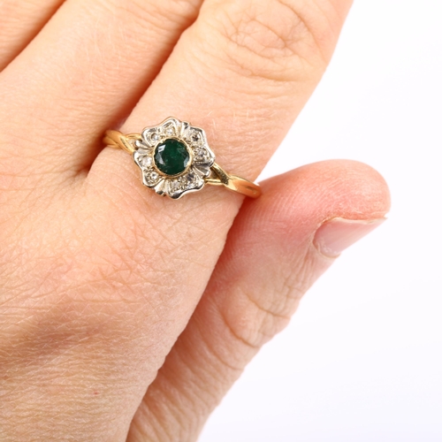 229 - An 18ct gold emerald and diamond cluster flowerhead ring, setting height 10.5mm, size T, 3.7g