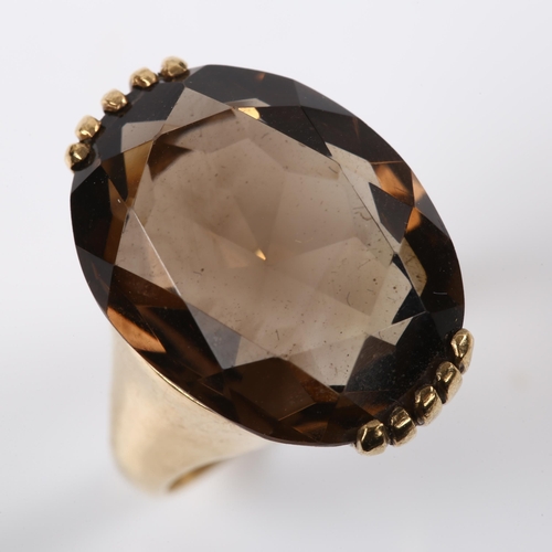 231 - A mid-20th century 9ct gold smoky quartz dress ring, hallmarks London 1968, setting height 21.5mm, s... 