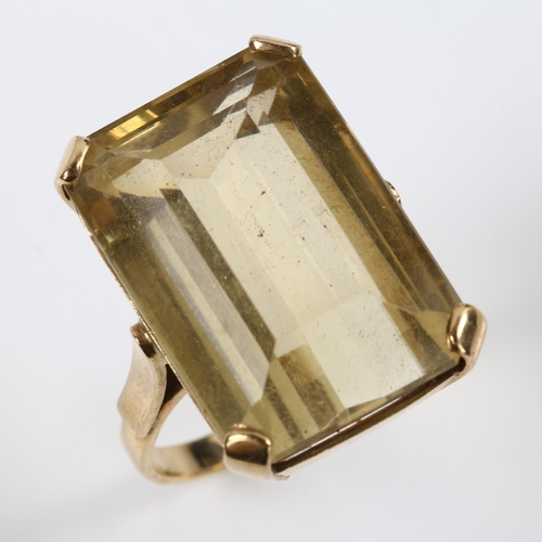 233 - A large 9ct gold citrine dress ring, setting height 26.1mm, size V, 14.3g