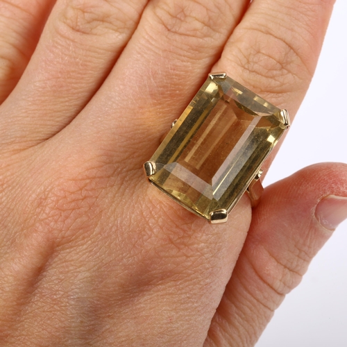 233 - A large 9ct gold citrine dress ring, setting height 26.1mm, size V, 14.3g