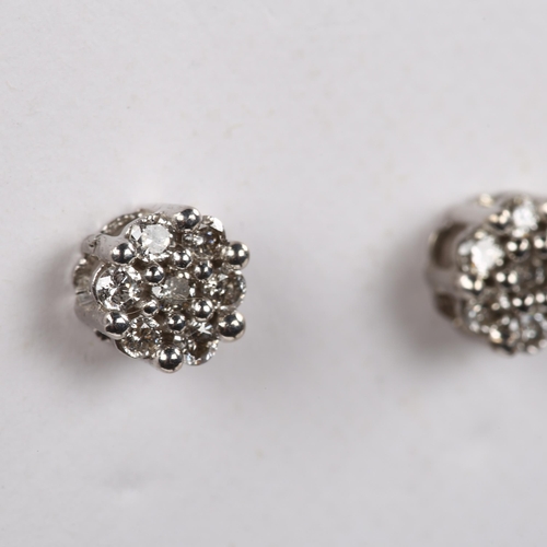 238 - A pair of diamond cluster earrings, 18ct white gold tops with 9ct stud fitting, set with modern roun... 