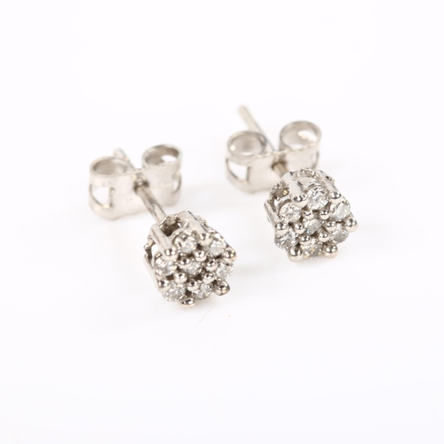 238 - A pair of diamond cluster earrings, 18ct white gold tops with 9ct stud fitting, set with modern roun... 