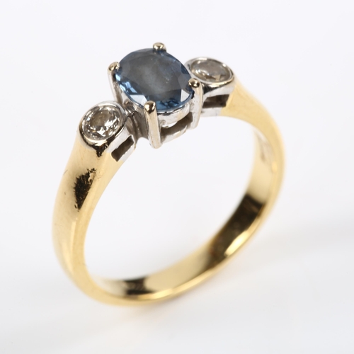 241 - An 18ct gold three stone sapphire and diamond ring, set with oval mixed-cut sapphire and modern roun... 