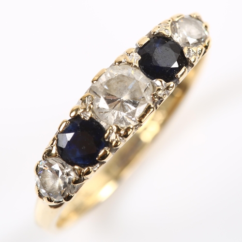 247 - A 9ct gold graduated five stone cubic zirconia and sapphire half hoop ring, setting height 4.8mm, si... 