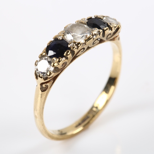 247 - A 9ct gold graduated five stone cubic zirconia and sapphire half hoop ring, setting height 4.8mm, si... 