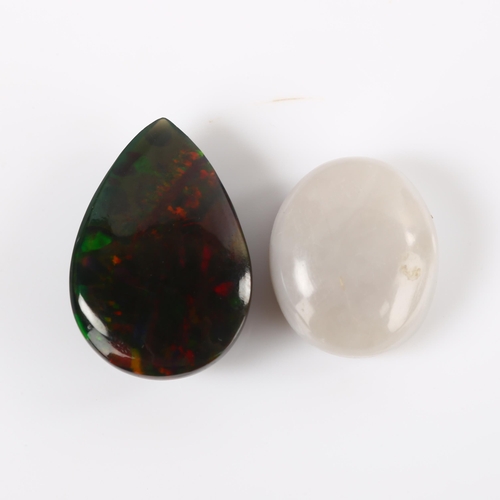 373 - 2 unmounted gemstones, comprising 4.15ct black opal, and 5.1ct white opal, both with gemstone report... 