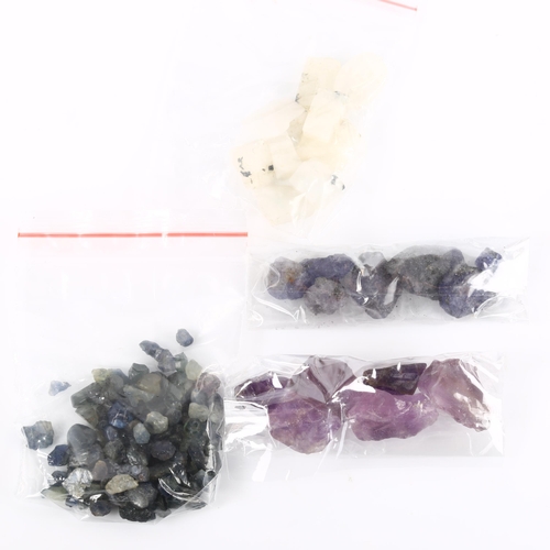 374 - 5 groups of rough unmounted gemstones, including 77.1ct blue sapphire, 50ct tanzanite, 41.2ct rainbo... 