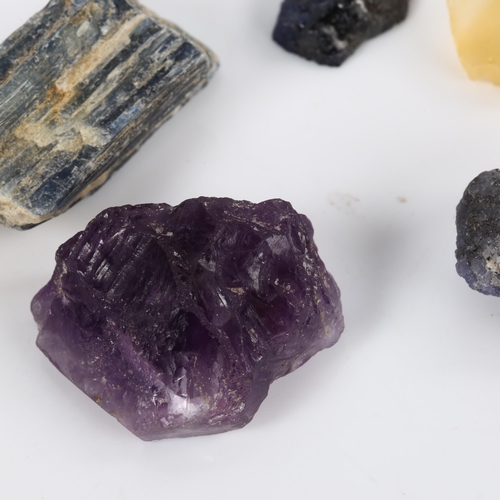 375 - A group of 5 unmounted rough gemstones, comprising 16.3ct blue sapphire, 55.6ct amethyst, 90.4ct kya... 