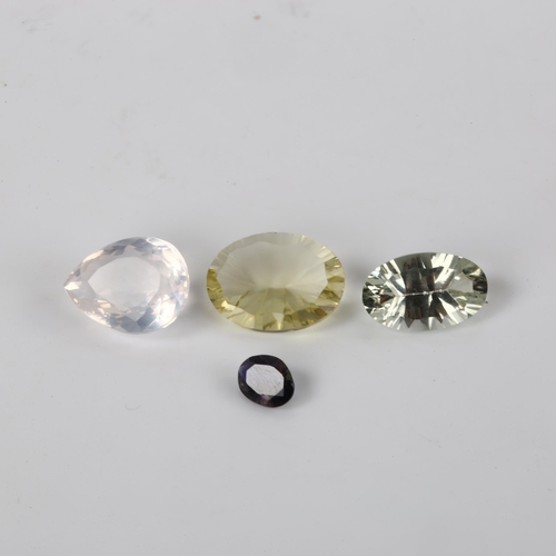 377 - A group of 4 unmounted gemstones, comprising 8ct concave-cut lemon quartz, 6.8ct green amethyst, 0.9... 