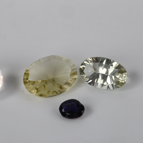 377 - A group of 4 unmounted gemstones, comprising 8ct concave-cut lemon quartz, 6.8ct green amethyst, 0.9... 