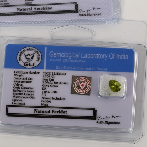 384 - 4 unmounted gemstones, comprising 28.85ct smoky quartz, 2.2ct peridot, 13.9ct ametrine, and 7.95ct p... 