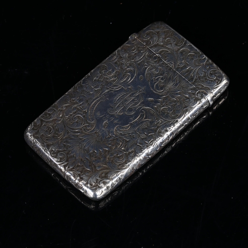 407 - A late Victorian silver cigarette case, allover engraved foliate decoration with gilded interior, by... 