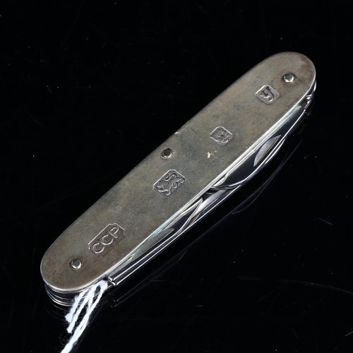 414 - An Elizabeth II silver multi-tool penknife, maker's marks CCP, hallmarks London 1998, length 9cm