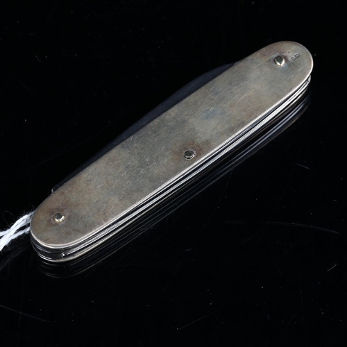 414 - An Elizabeth II silver multi-tool penknife, maker's marks CCP, hallmarks London 1998, length 9cm