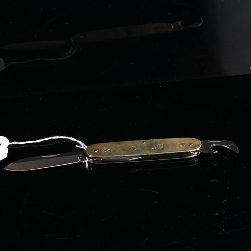 414 - An Elizabeth II silver multi-tool penknife, maker's marks CCP, hallmarks London 1998, length 9cm