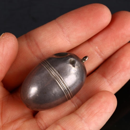 417 - A Georgian silver egg-shaped nutmeg grater case, by Samuel Meriton, circa 1800, length 3.5cm