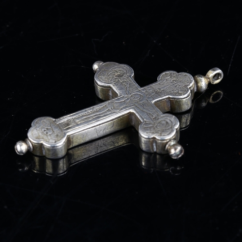 418 - A rare 16th century silver crucifix cross pendant, with screw fasteners opening to reveal compartmen... 