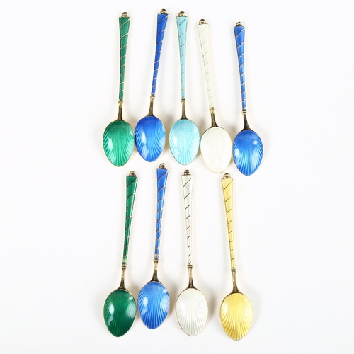 429 - EGON LAURIDSEN - a set of 9 Danish vermeil sterling silver and harlequin enamel coffee spoons, with ... 