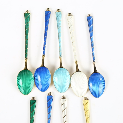 429 - EGON LAURIDSEN - a set of 9 Danish vermeil sterling silver and harlequin enamel coffee spoons, with ... 