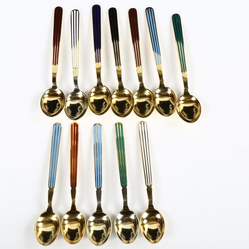 430 - ANTON MICHELSEN - a set of 12 Danish vermeil sterling silver and harlequin enamel coffee spoons, len... 