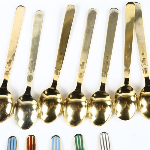 430 - ANTON MICHELSEN - a set of 12 Danish vermeil sterling silver and harlequin enamel coffee spoons, len... 