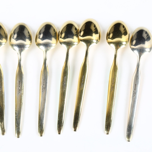 435 - ABSA - a set of 8 Danish vermeil sterling silver and harlequin enamel coffee spoons, length 9.5cm