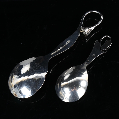 436 - An Art Nouveau Danish silver caddy spoon and similar preserve spoon, largest length 14.5cm, 1.4oz to... 