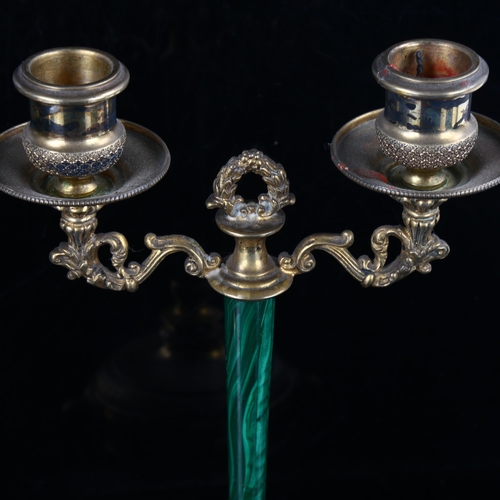 440 - A pair of Italian silver-gilt malachite twin-branch table candlesticks, with foliate supports and li... 