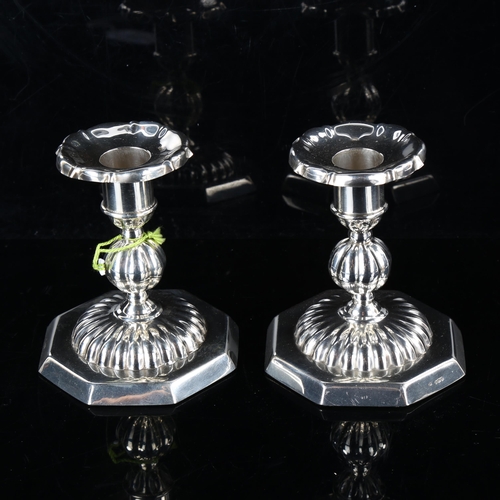 441 - A pair of Maltese sterling silver squat candlesticks, lobed body on octagonal bases, height 10cm, lo... 