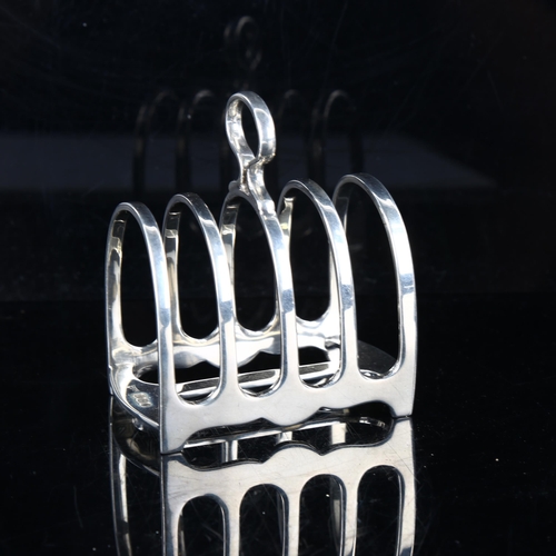 447 - A George V silver 5-bar toast rack, by Walker & Hall, hallmarks Sheffield 1926, length 7.5cm, 4.3oz