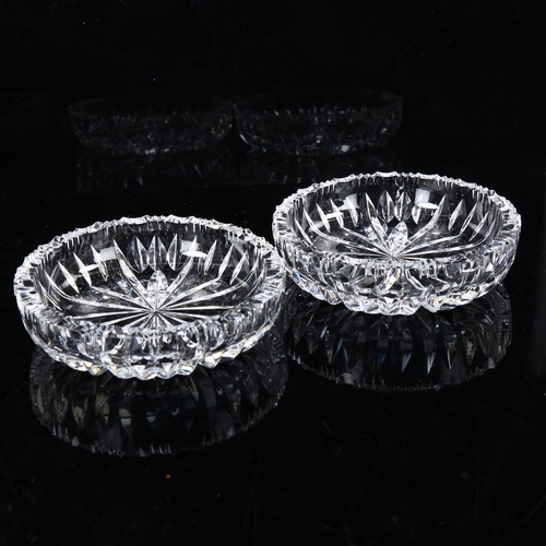 461 - A pair of glass butter dishes, with silver butter knives, hallmarks Sheffield 1937, dish diameter 10... 