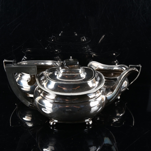 464 - A George V silver 3-piece tea set, comprising teapot, 2-handled sugar bowl and cream jug, in Queen A... 