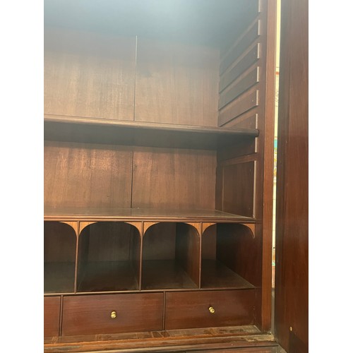 1246 - An impressive George III flame veneer mahogany bureau bookcase, with bevel mirror panelled cupboards... 