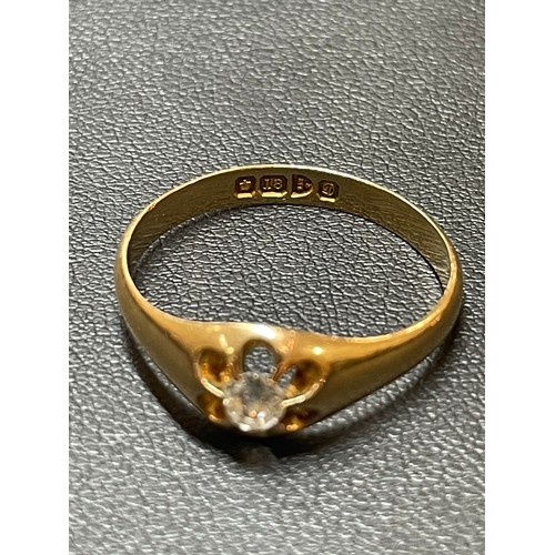 136 - An early 20th century 18ct gold solitaire diamond gypsy ring, set with 0.2ct old European-cut diamon... 