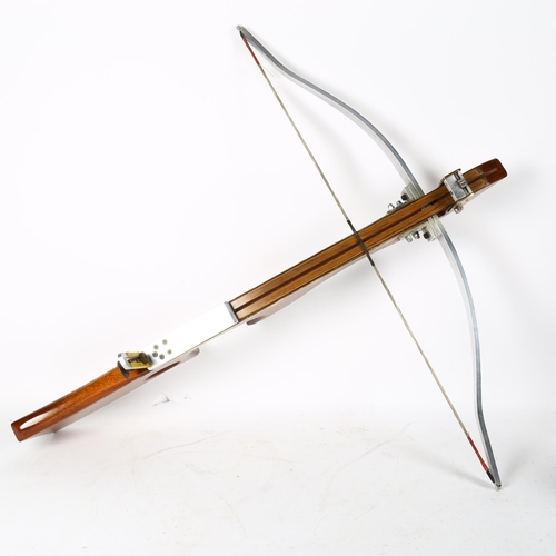 120 - A modern brass-mounted mahogany crossbow, width 85cm, length 90cm