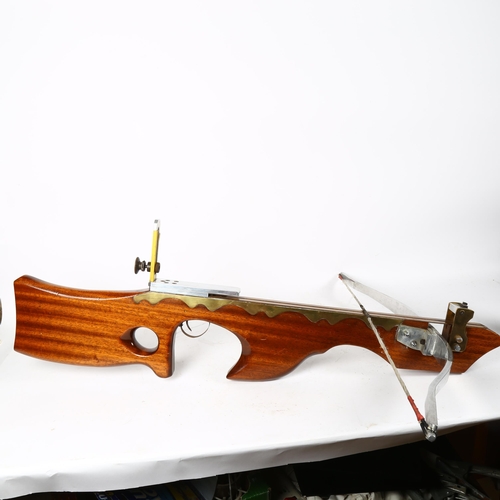 120 - A modern brass-mounted mahogany crossbow, width 85cm, length 90cm
