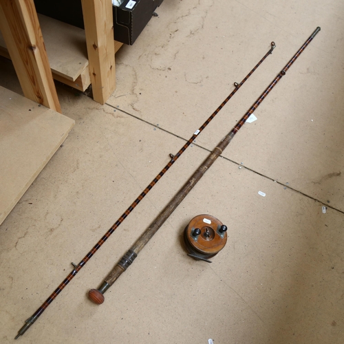 121 - A Vintage fishing rod, by J J S Walker, Bampton & Co, serial no. 10972, overall length 300cm, and a ... 