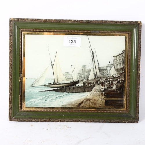 125 - A coloured photographic print of Hastings yachts starting, framed, overall 23cm x 29cm