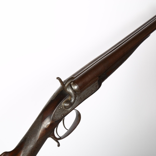 24 - THOMAS TURNER - a rare double-barrel shotgun, with rebounding back-action locks with scroll and game... 